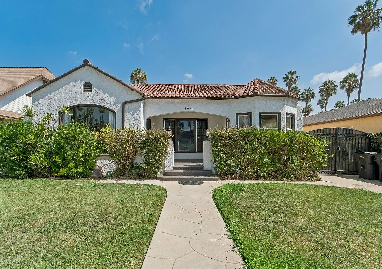 Classic Spanish-Style Single-Family Home with Hardwood Floors & Private Backyard — Photo 3