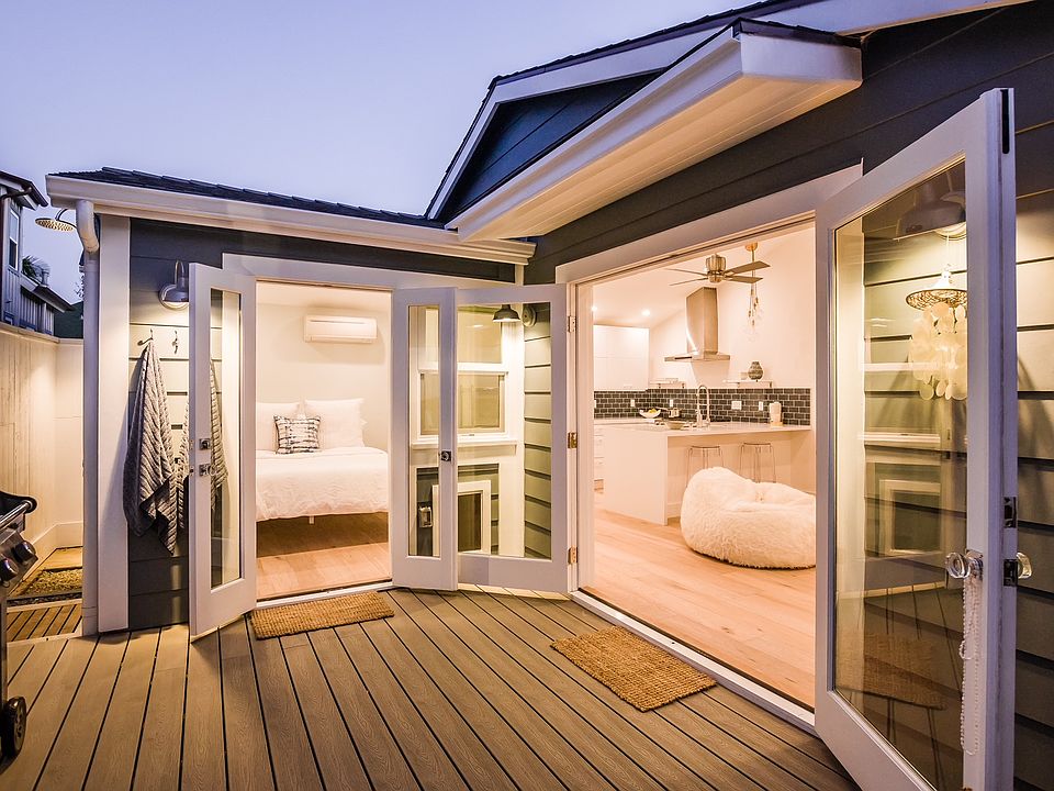 Private patio with French doors leading from living room and bedroom into patio