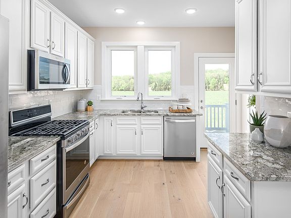 Model Representation - Stunning Kitchen with Granite Counters and KitchenAid Appliances