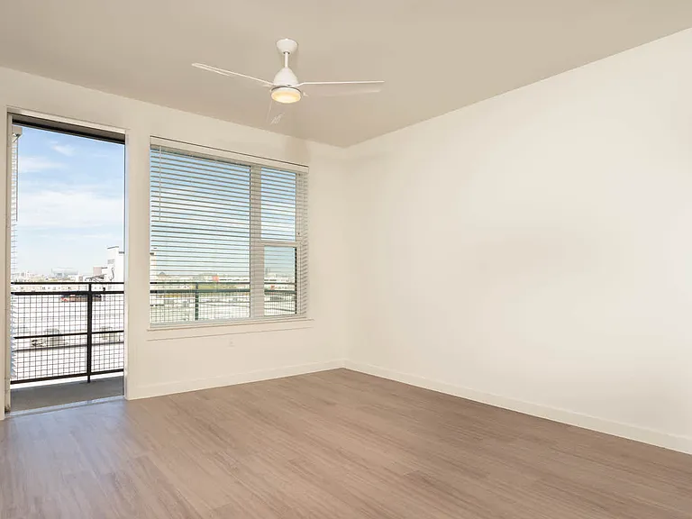Living Room with Balcony and Hard Surface Flooring