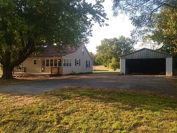 Paved parking and garage