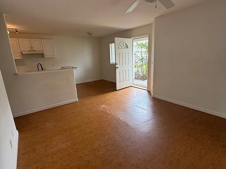 View from living room to kitchen / dining / entry