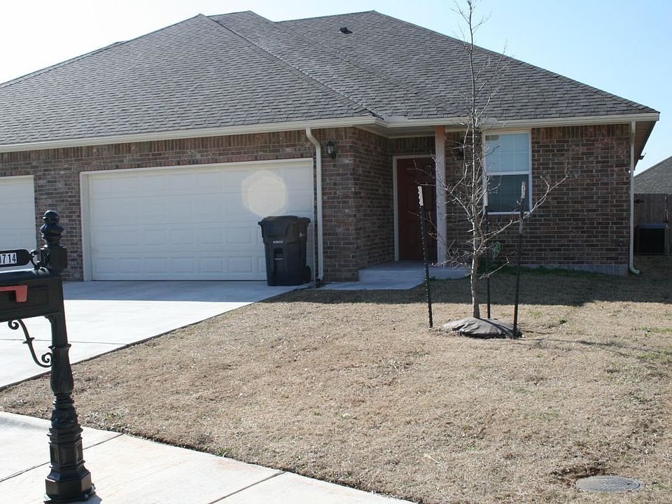 Front View - with 2 car garage