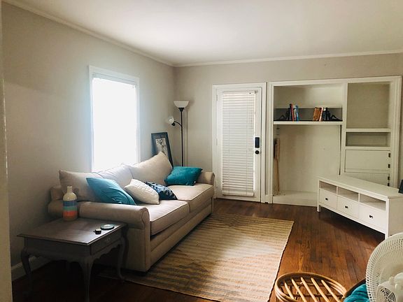 Living room, door to screened in patio