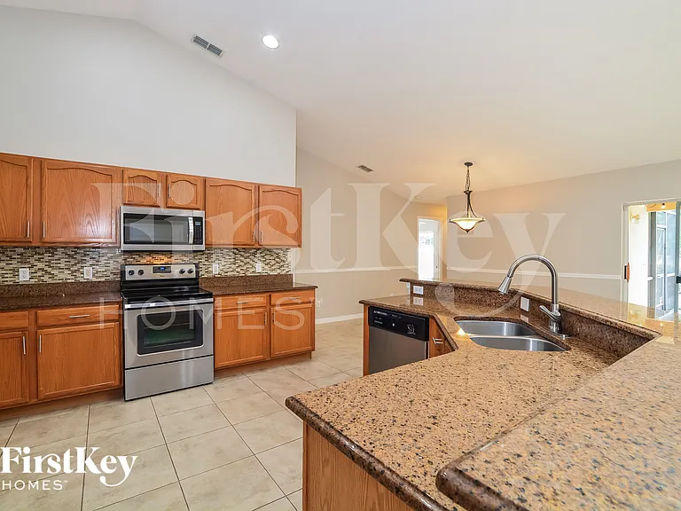 13219 Lakewind Dr — Photo 6