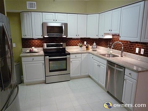 Large Kitchen with Granite and Stainless Steel Appliances