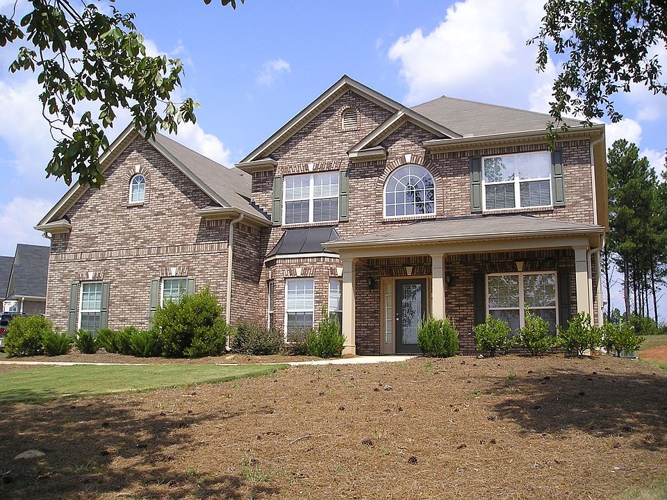 3 Sides Brick w/Concrete Siding on Back!