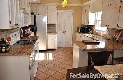 Kitchen
						:
						Granite kitchen includes all major appliances.