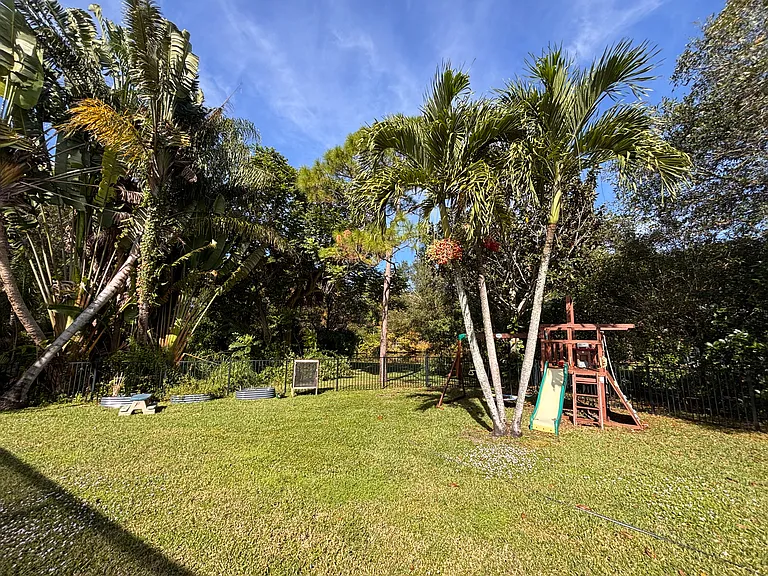 Outdoor haven -- play ground, raised garden beds if you choose, a butterfly house for raising Monarch butterflies year round!