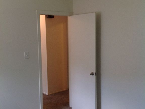 View of bedroom from back wall