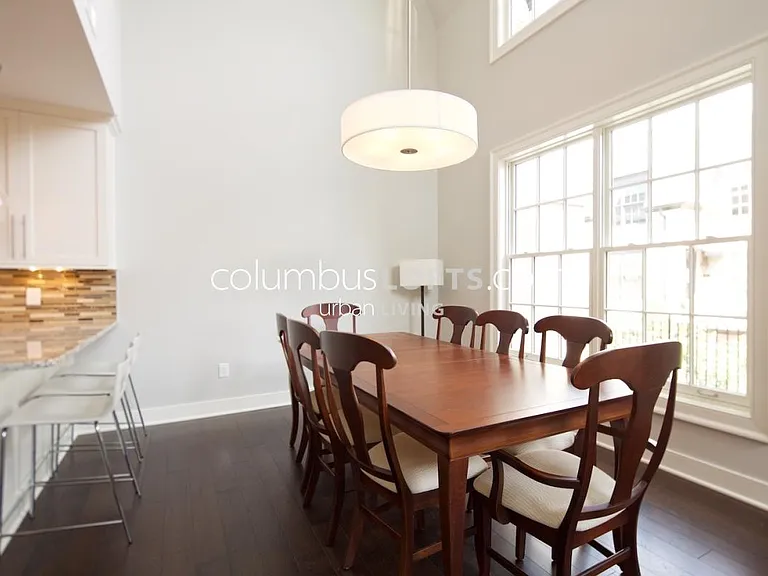 interior dining room - main level (windows look out onto private front porch patio)