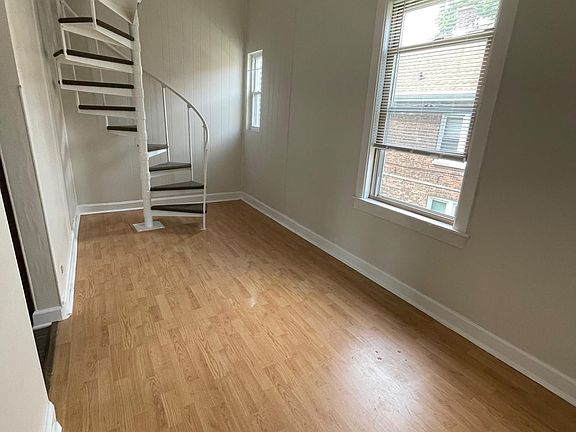 Room off kitchen with stairs to attic space - can be your dining room or used as a bedroom
