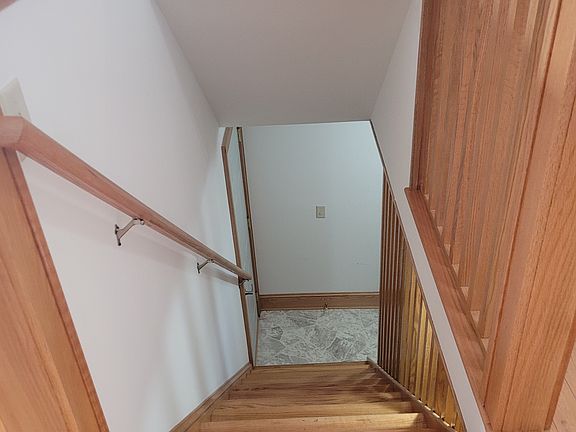 down the stairs to lower level where bath and mech room are.