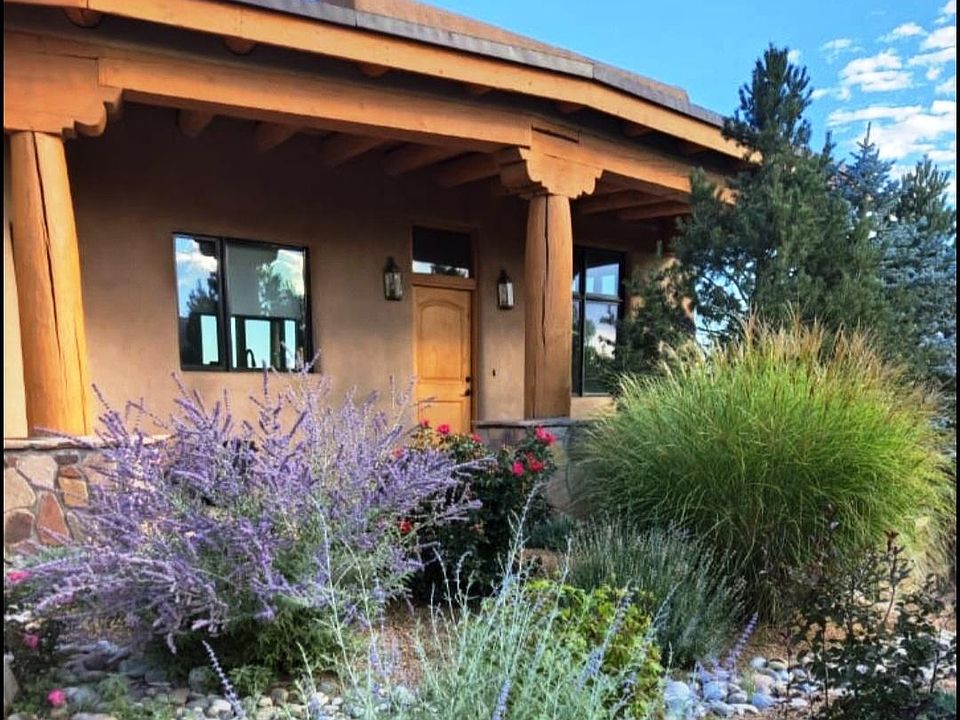 Front Door faces West and the garden area, put a bench and sit while watching the sunset with a glass of wine.