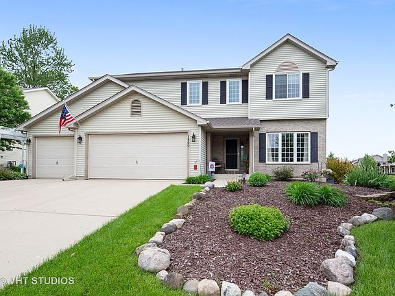 You will love this awesome corner lot with its beautiful landscaping!