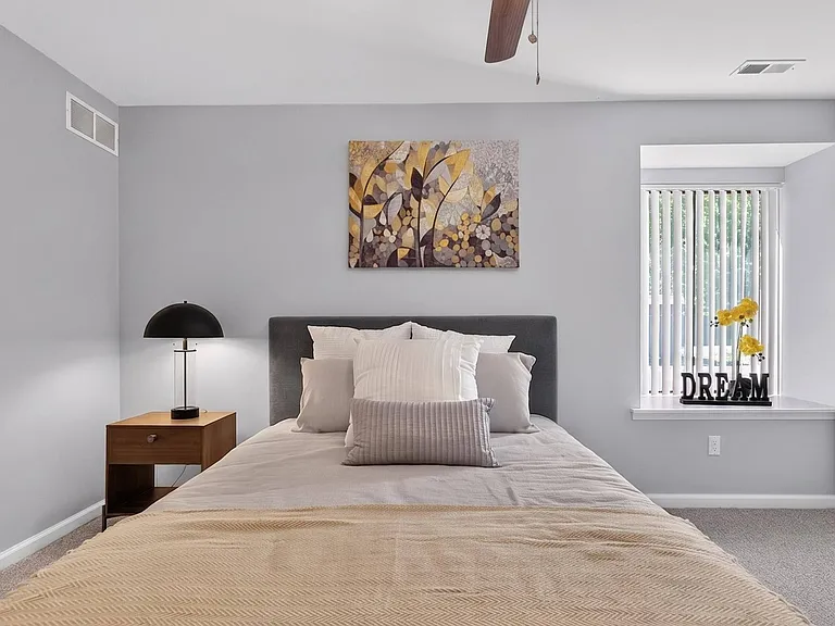 Spacious Bedroom with Ample Storage at Lakeside Village Apartments in Clinton Township, MI