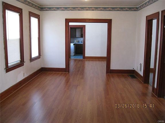 Living room lookng toward kitchen upper unit