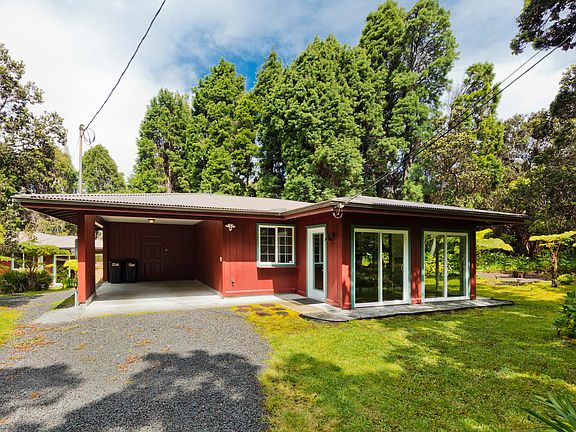 Cottage with attached carport