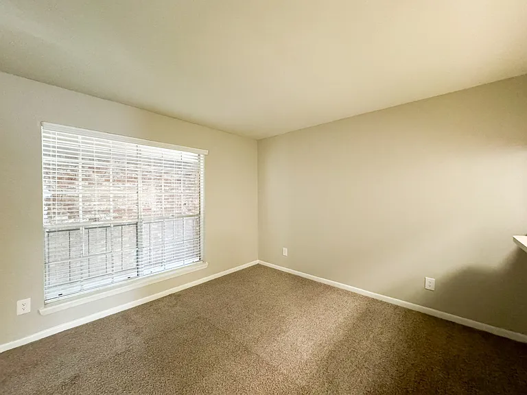 Living room with soft tones and sunlight