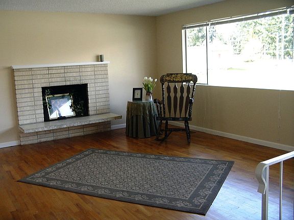 Red Oak floors wood burning fireplace