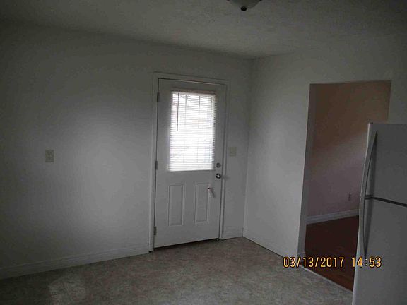 Side door off eat in kitchen