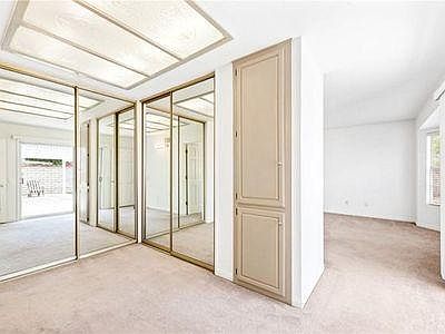 Master bedroom with large wardrobe area