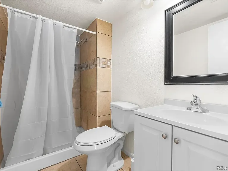 921 S Walden St #105 — Photo 12