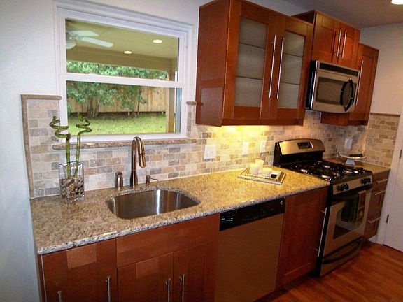 Beautifull tile and granite countertops and new cabinets.