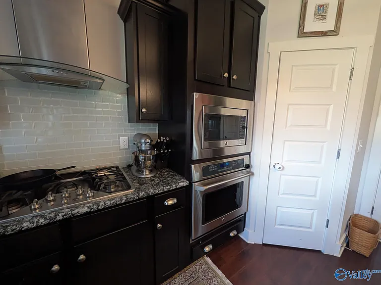 7601 Ashor Dr NW — Photo 24