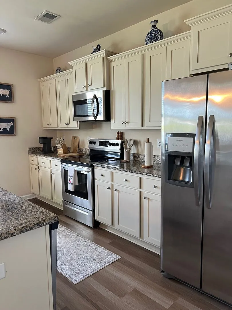 Coming Soon in the *St. James School District* ~ Don't miss this spacious, fully furnished 4-bedr... — Photo 1