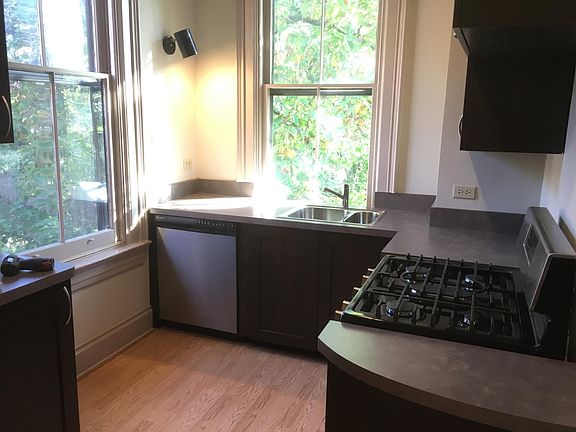 Kitchen with all modern appliances, including gas range/oven, dishwasher, disposer, new refrigerator and space for kitchen table (not shown)