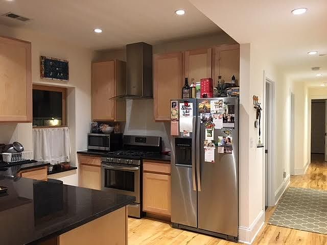 Stainless appliances, granite counters, plenty of cabinet sp
