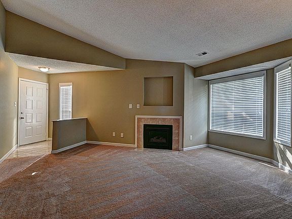 Entry & Living Area w/ Vaulted Ceilings