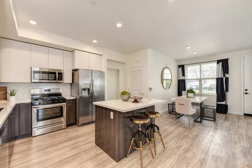 Kitchen with Hardwood Inspired Flooring - Morgan Ranch Apartments
