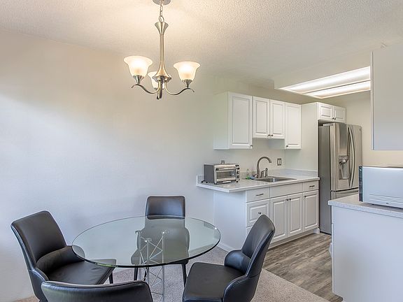 Dining area leading to kitchen