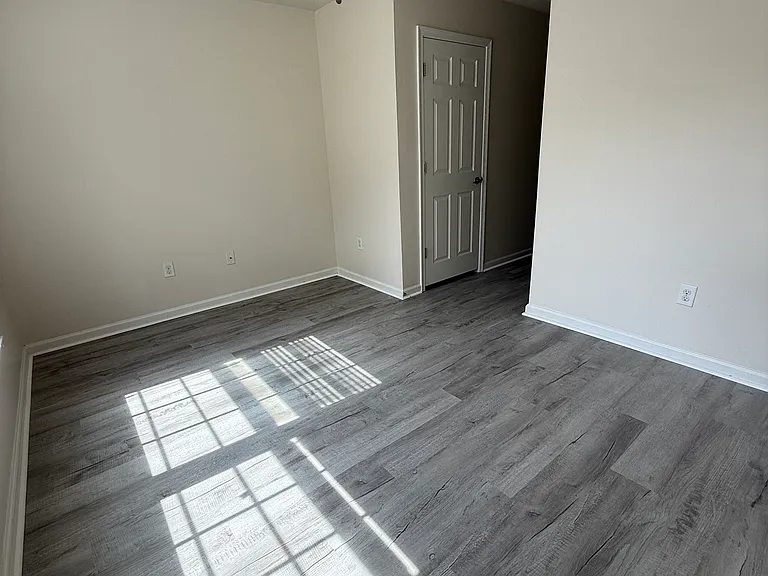 Upstairs primary bedroom, faces front yard. (1st of 3)