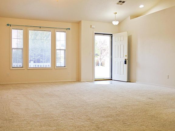 Living room with vaulted ceilings