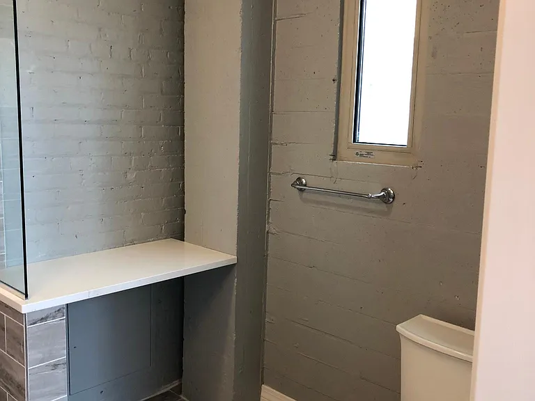 Master bathroom vanity table and toilet