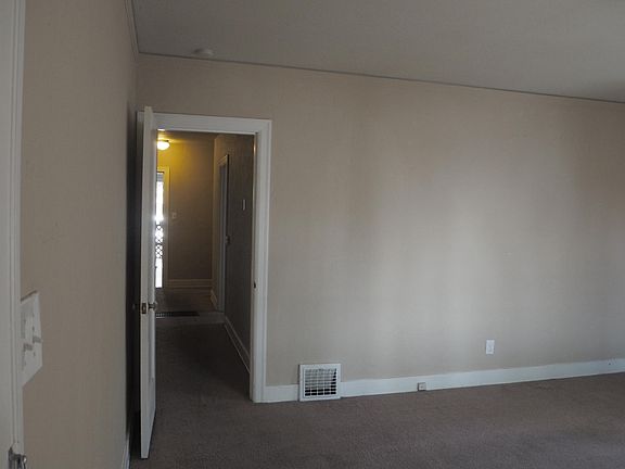 North Living Room Wall and view down front hall