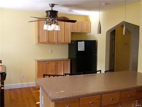 Extension of kitchen with additional cabinet space.