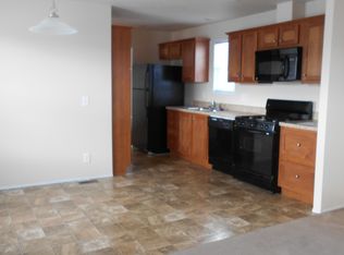 980 Elmwood Rd, Howard City, MI 49329