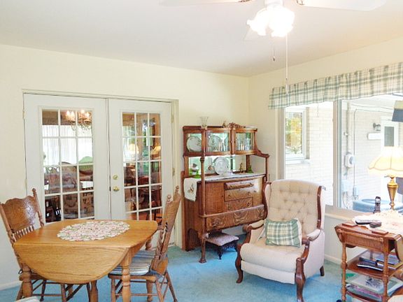 French doors off dining area to Florida room.