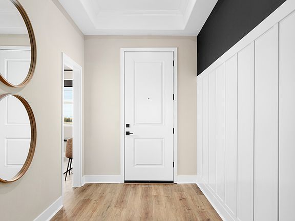 Foyer with decorative wall