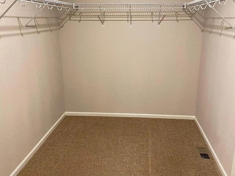 Main bedroom walk in closet
