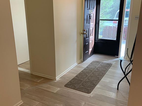 Entryway, freshly painted with new flooring