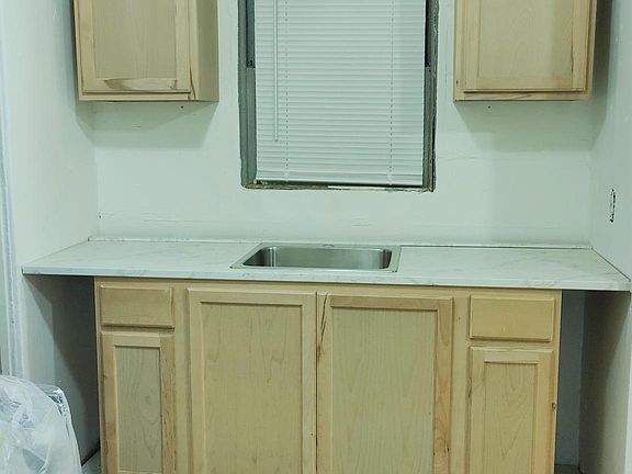 New kitchen cabinets and sink. Breakfast nook area too.