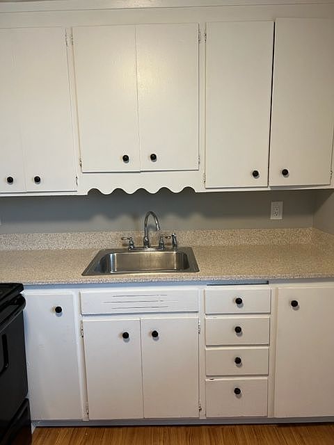 Kitchen sink and cabinets