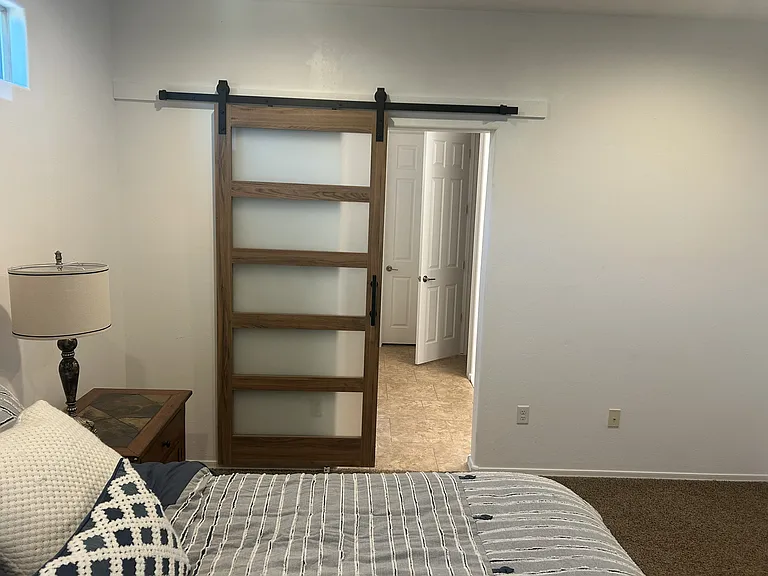Barn Door creates a private master bath allowing later sleepers to enjoy!