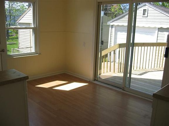 Pergo Flooring and Door Wall to Backyard