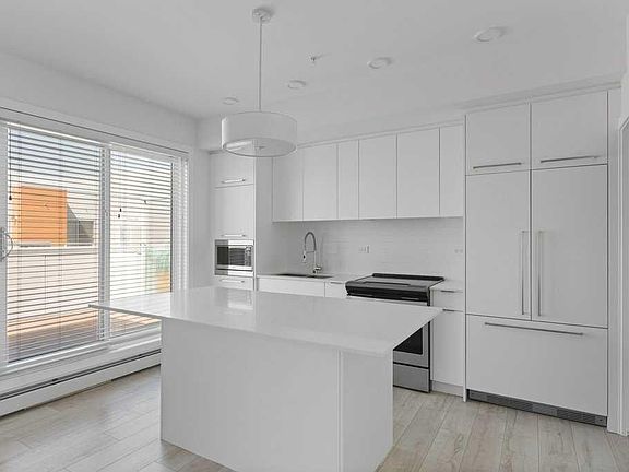 3rd image of 3130 W Thirsk St NW #415